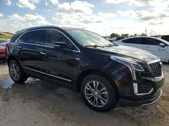 2021 Cadillac Xt5 VIN 1GYKNCRS0MZ173433 COPART salvage auction — WATER/FLOOD, Fl - Certificate Of Destruction, sold $7,800 on 2026-07-16 (photo 4)
