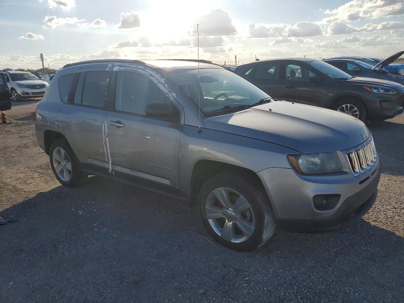 2016 Jeep Compass VIN 1C4NJCBA3GD611556 COPART salvage auction — WATER/FLOOD, Fl - Cert Of Title-Slvg Rebld Flood, sold $1,650 on 2026-08-10 (photo 4)
