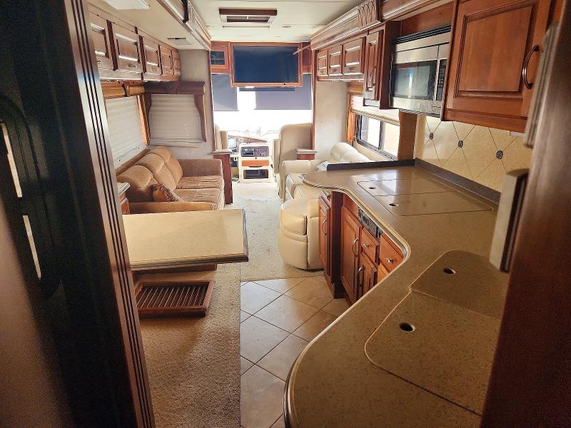 2005 Roadmaster rail All models VIN 1RF43564952036631 COPART salvage auction — SIDE, FL - CERT OF TITLE-SLVG REBLD FLOOD (P), sold $12,500 on 2026-07-27 (photo 5)