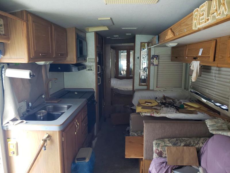 1999 Fleetwood Motor home VIN 3FCNF53S3XJA17527 COPART salvage auction — REAR END, MA - CERT OF TITLE-RECONSTRCTD COLL, sold $1,600 on 2026-07-29 (photo 6)