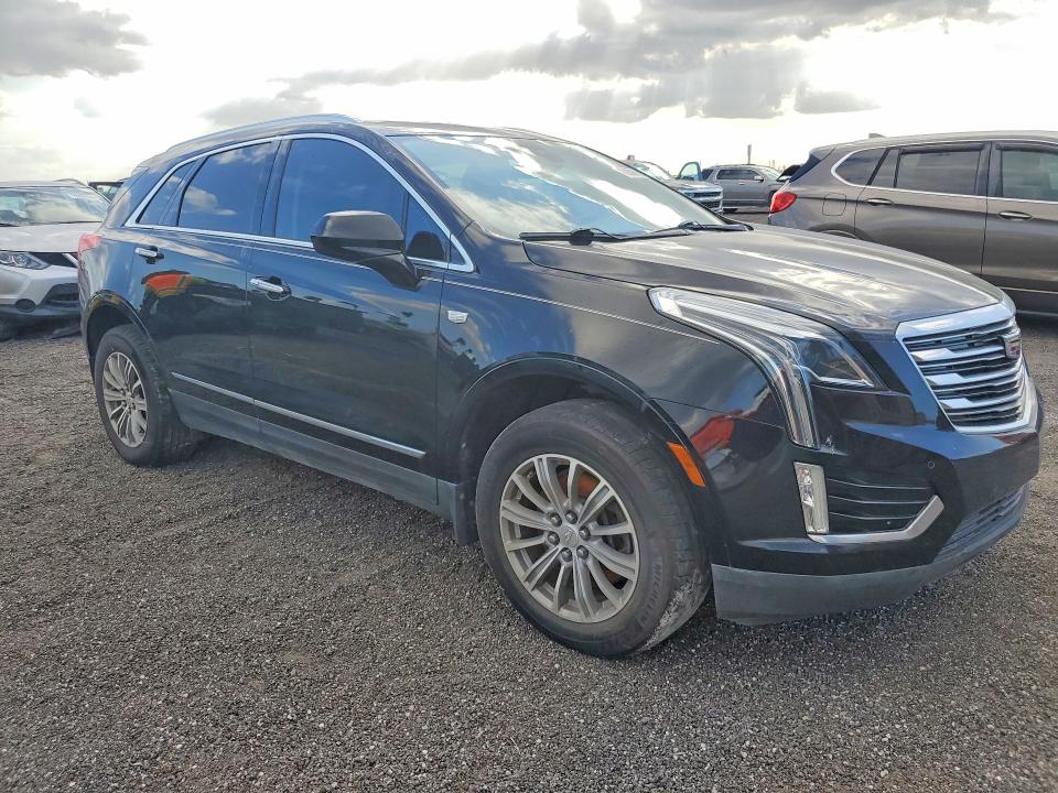 2017 Cadillac Xt5 VIN 1GYKNCRS7HZ130553 COPART salvage auction — WATER/FLOOD, Fl - Cert Of Title-Slvg Rebld Flood, sold $4,900 on 2026-07-18 (photo 4)