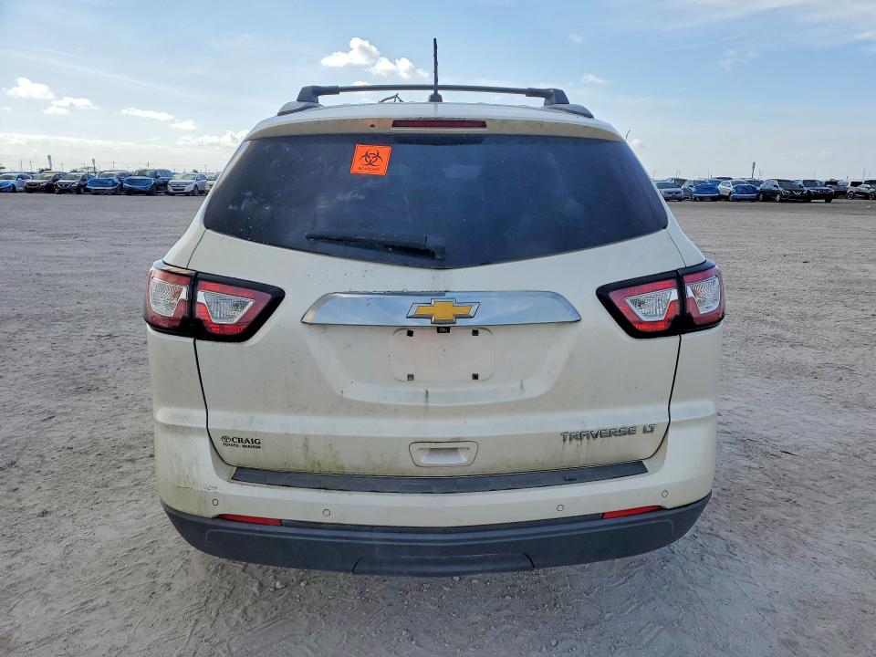 2014 Chevrolet Traverse VIN 1GNKRHKD0EJ331733 COPART salvage auction — WATER/FLOOD, Fl - Cert Of Title-Slvg Rebld Flood, sold $1,400 on 2026-08-24 (photo 6)