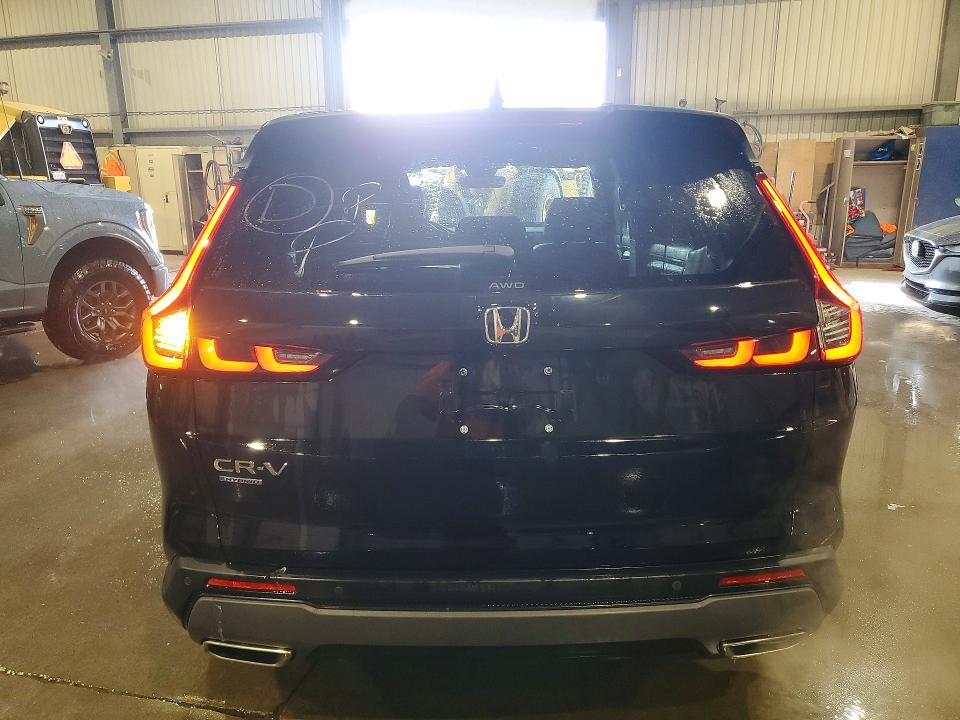 2024 Honda Crv VIN 2HKRS6H77RH216143 COPART salvage auction — VANDALISM, ON - PERMIT NO BRAND - UNFIT, sold $28,250 on 2026-07-08 (photo 6)