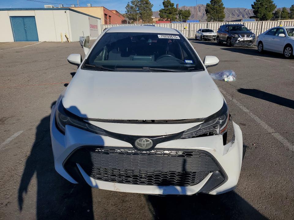 2021 Toyota Corolla hatchback VIN JTNB4MBE2M3106401 COPART salvage auction — ALL OVER, Tx - Certificate Of Title, sold $1,900 on 2026-07-17 (photo 5)