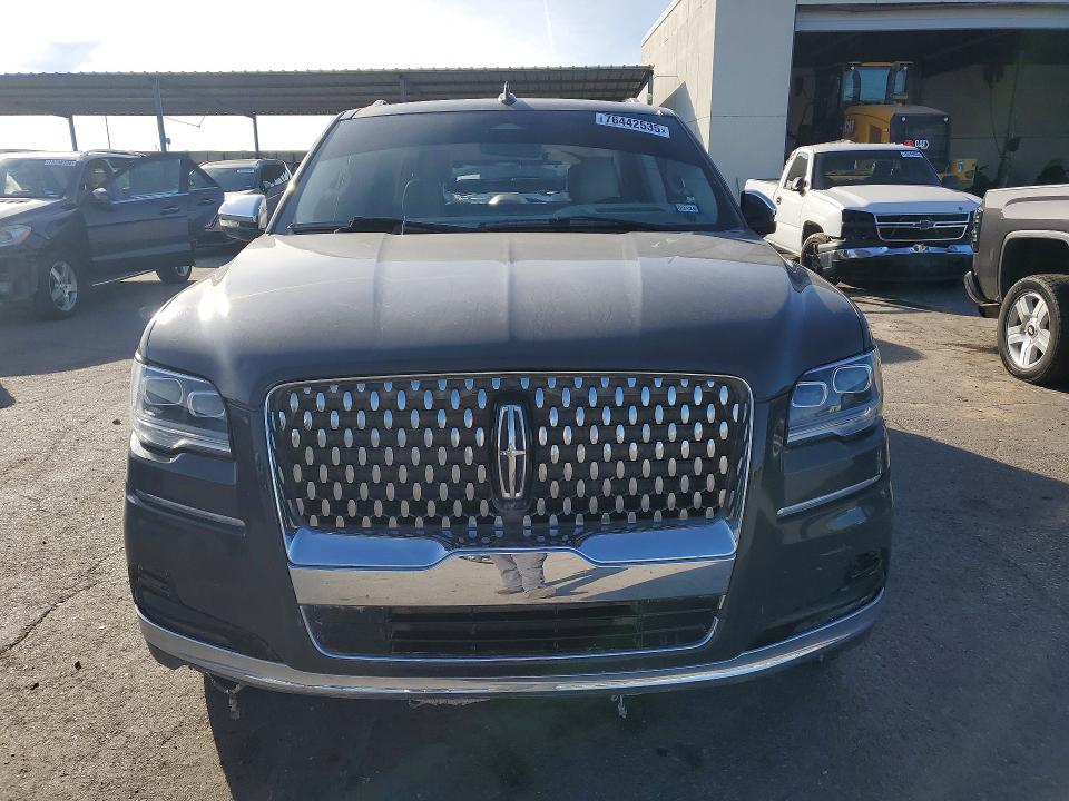 2023 Lincoln Navigator VIN 5LMJJ2TG3PEL15886 COPART salvage auction — Vandalized, TX - SALVAGE VEHICLE TITLE, sold $19,400 on 2026-04-24 (photo 5)