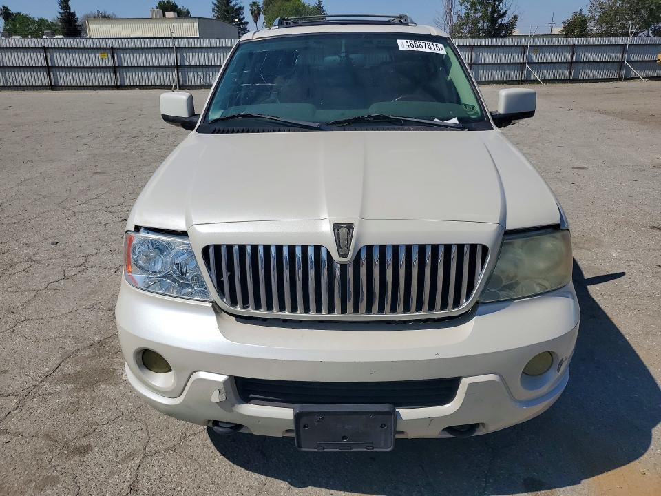 2004 Lincoln townhouse Navigator VIN 5LMFU27R34LJ37915 COPART salvage auction — MINOR DENT/SCRATCHES, CA - DIS/DLR/EXP ONLY CLEAN TITLE (P), sold $500 on 2026-07-27 (photo 5)