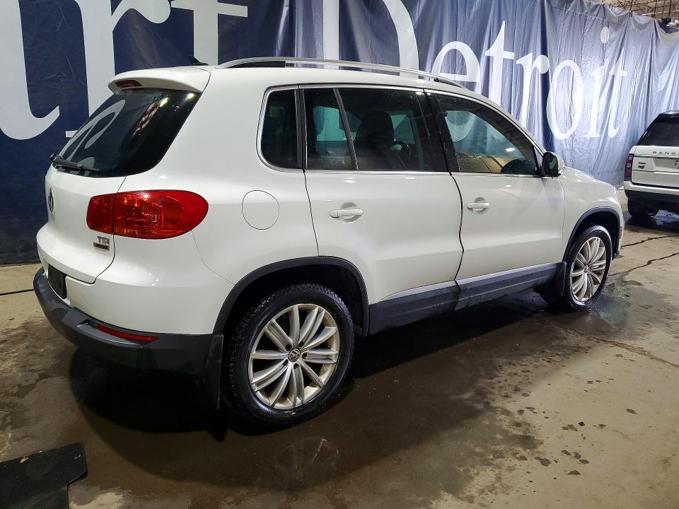2016 Volkswagen Tiguan VIN WVGBV7AX5GW576815 COPART salvage auction — WATER/FLOOD, OH - CERT OF TITLE-SALVAGE, sold $950 on 2026-07-03 (photo 3)