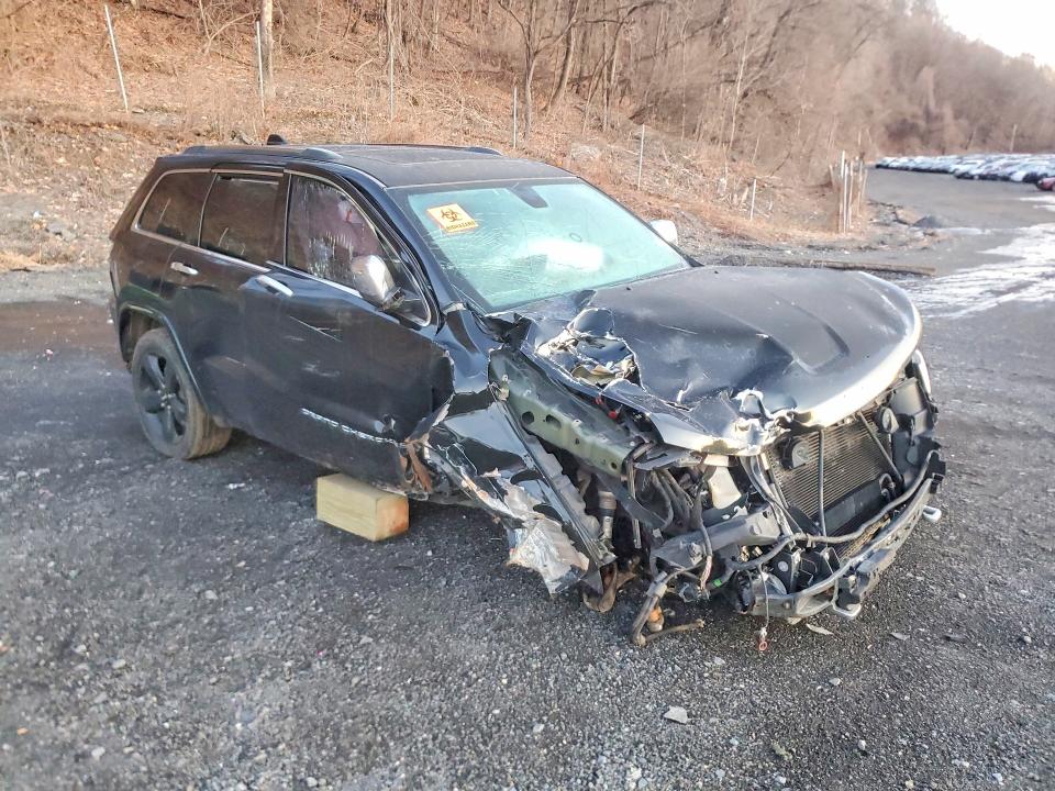 2015 Jeep Cherokee VIN 1C4RJFCG9FC871373 COPART salvage auction — ROLLOVER, NH - CERT OF TITLE-SALVAGE, sold $400 on 2026-07-02 (photo 4)