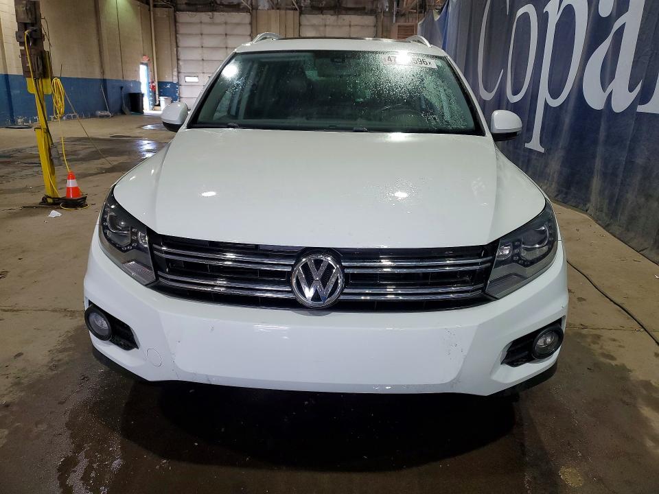 2016 Volkswagen Tiguan VIN WVGBV7AX5GW576815 COPART salvage auction — WATER/FLOOD, OH - CERT OF TITLE-SALVAGE, sold $950 on 2026-07-03 (photo 5)