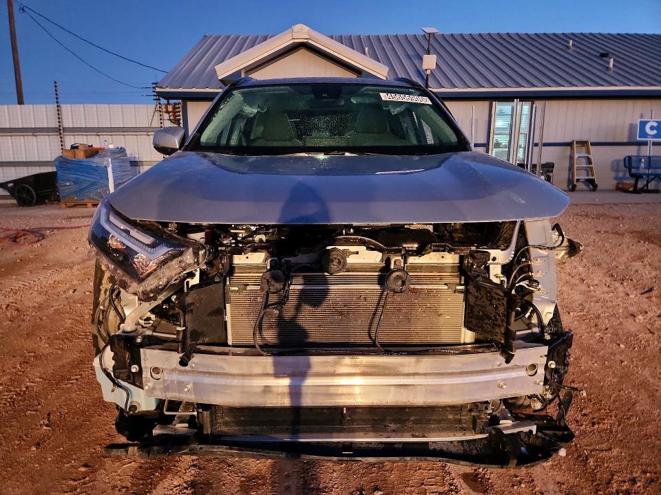 2025 Toyota Rav4 VIN JTMMWRFVXSD306710 COPART salvage auction — SIDE, TX - SALVAGE VEHICLE TITLE, sold $11,500 on 2026-07-02 (photo 5)