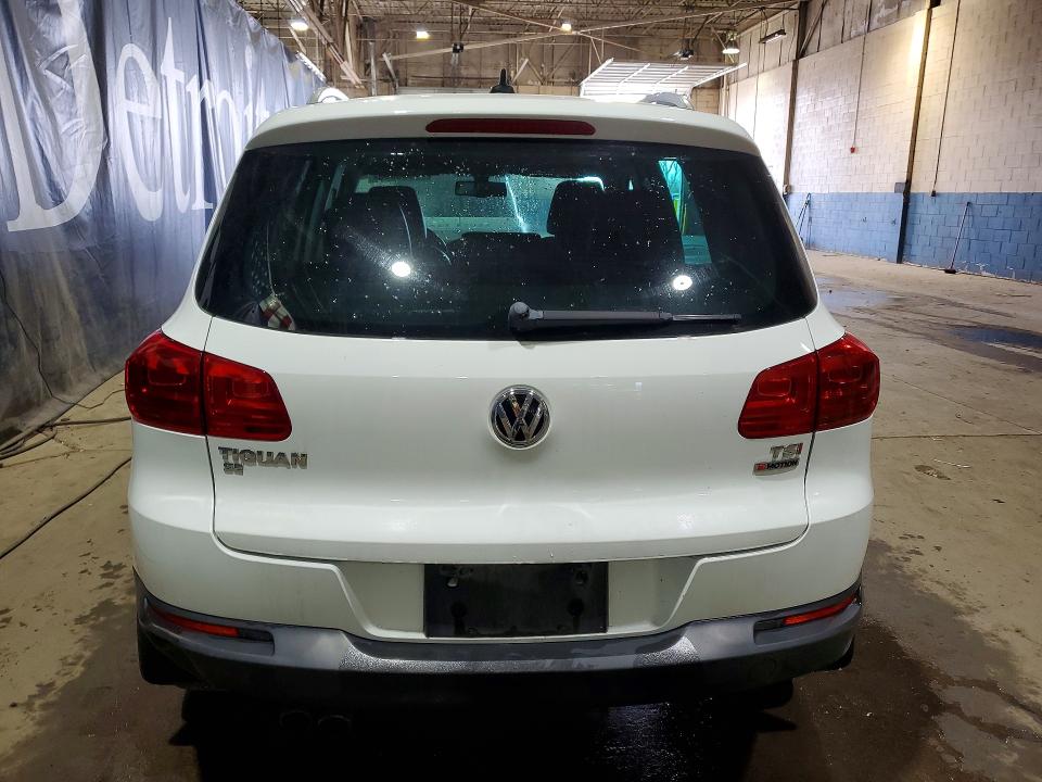 2016 Volkswagen Tiguan VIN WVGBV7AX5GW576815 COPART salvage auction — WATER/FLOOD, OH - CERT OF TITLE-SALVAGE, sold $950 on 2026-07-03 (photo 6)