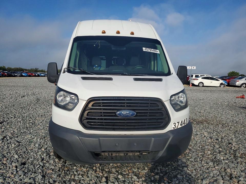 2019 Ford Transit VIN 1FDVU4XV7KKB31559 COPART salvage auction — MINOR DENT/SCRATCHES, Fl - Cert Of Title Slvg Rebuildable, sold $13,800 on 2026-07-29 (photo 5)