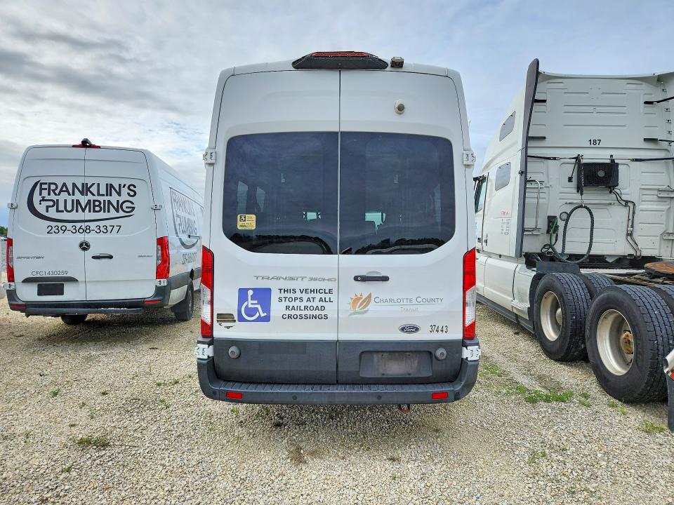 2019 Ford Transit VIN 1FDVU4XV7KKB31559 COPART salvage auction — MINOR DENT/SCRATCHES, Fl - Cert Of Title Slvg Rebuildable, sold $13,800 on 2026-07-29 (photo 6)