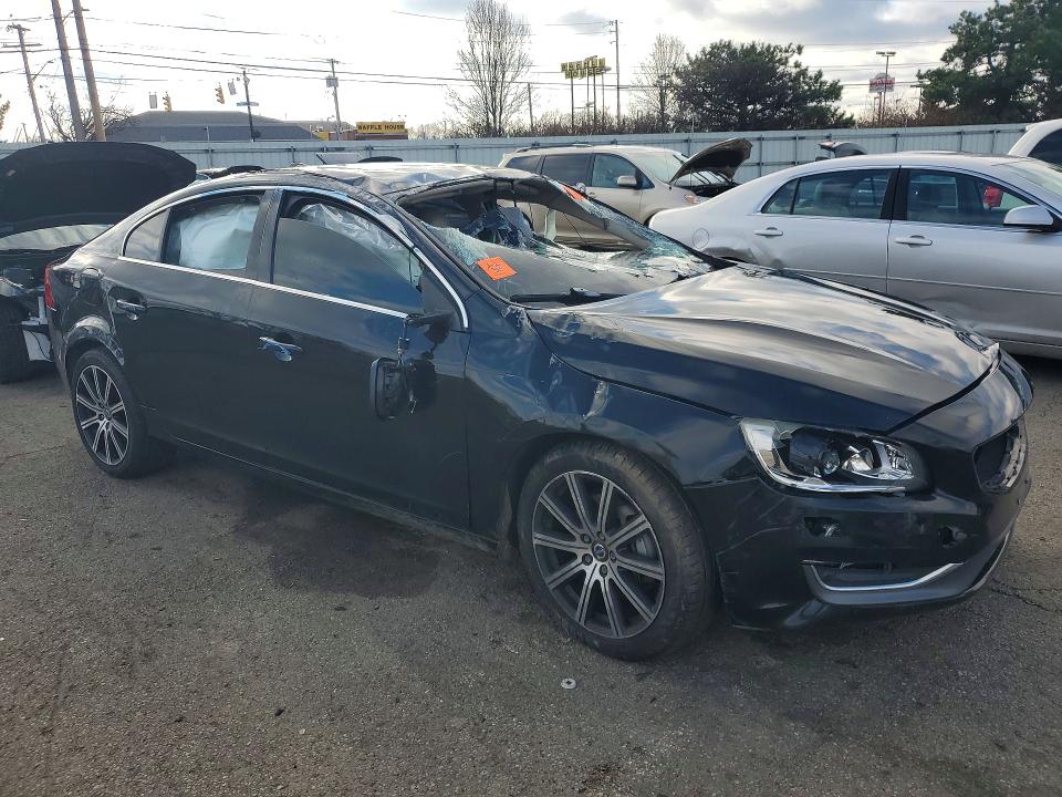 2017 Volvo S60 VIN LYV402TM8HB129758 COPART salvage auction — ALL OVER, In - Certificate Of Title (P), sold $1,450 on 2026-07-08 (photo 4)