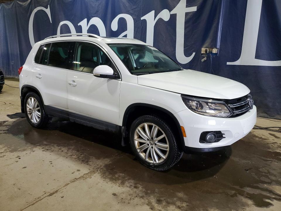 2016 Volkswagen Tiguan VIN WVGBV7AX5GW576815 COPART salvage auction — WATER/FLOOD, OH - CERT OF TITLE-SALVAGE, sold $950 on 2026-07-03 (photo 4)