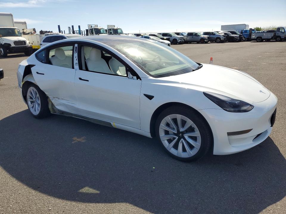2023 Tesla Model 3 VIN 5YJ3E1EA6PF519586 COPART salvage auction — Rear End, HI - CERTIFICATE OF SALVAGE, sold $5,000 on 2026-05-22 (photo 4)