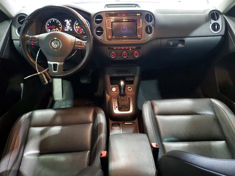 2016 Volkswagen Tiguan VIN WVGBV7AX5GW576815 COPART salvage auction — WATER/FLOOD, OH - CERT OF TITLE-SALVAGE, sold $950 on 2026-07-03 (photo 8)