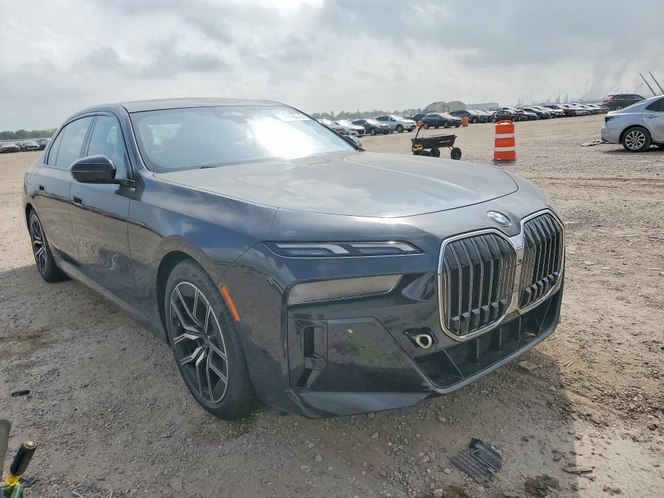 2023 BMW 7 series VIN WBA23EH00PCM21708 COPART salvage auction — Water/Flood, TX - SALVAGE TITLE-FLOOD DAMAGE, sold $36,500 on 2026-05-07 (photo 4)