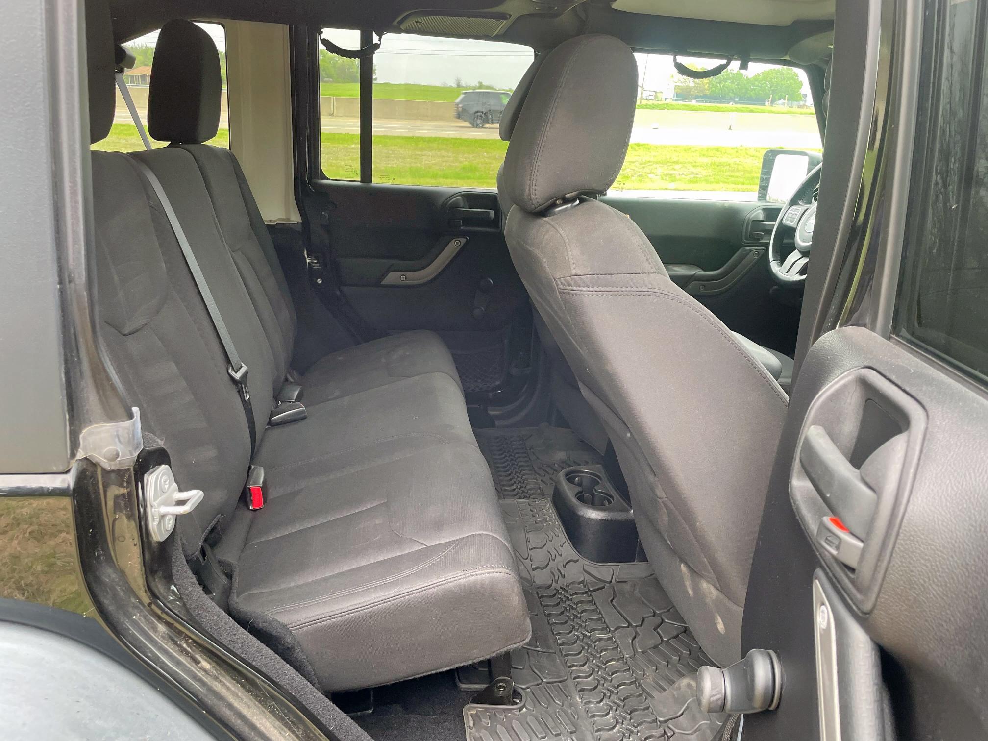 2016 Jeep Wrangler Unlimited VIN 1C4BJWDG7GL103053 COPART salvage auction — NORMAL WEAR, TX - CERT OF TITLE-REBUILT SALVAGE (P), sold $12,800 on 2025-04-15 (photo 6)