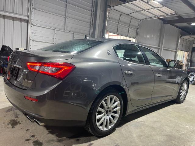 2017 Maserati Ghibli VIN ZAM57XSA9H1206127 COPART salvage auction — DAMAGE HISTORY, TX - CERT OF TITLE-REBUILT SALVAGE (P), sold $32,750 on 2025-05-05 (photo 4)