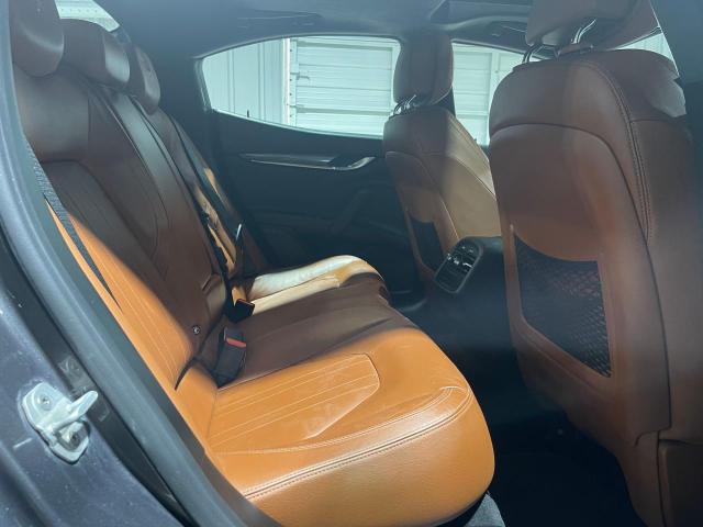 2017 Maserati Ghibli VIN ZAM57XSA9H1206127 COPART salvage auction — DAMAGE HISTORY, TX - CERT OF TITLE-REBUILT SALVAGE (P), sold $32,750 on 2025-05-05 (photo 6)