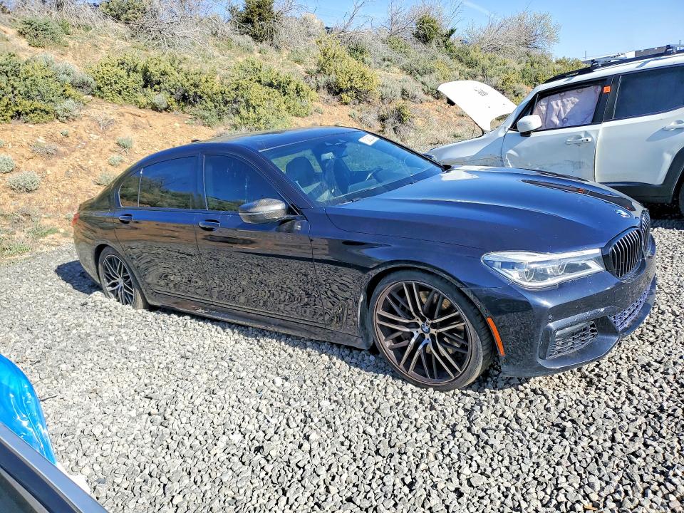 2017 BMW 7 series VIN WBA7F0C33HGM22122 COPART salvage auction — MINOR DENT/SCRATCHES, Ca - Certificate Of Title, sold $6,400 on 2026-07-02 (photo 4)