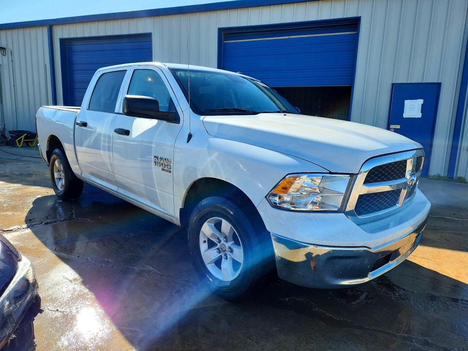 2023 Ram 1500 VIN 3C6RR7KG9PG662186 COPART salvage auction — MINOR DENT/SCRATCHES, AR - CERTIFICATE OF TITLE, sold $18,800 on 2026-07-02 (photo 4)