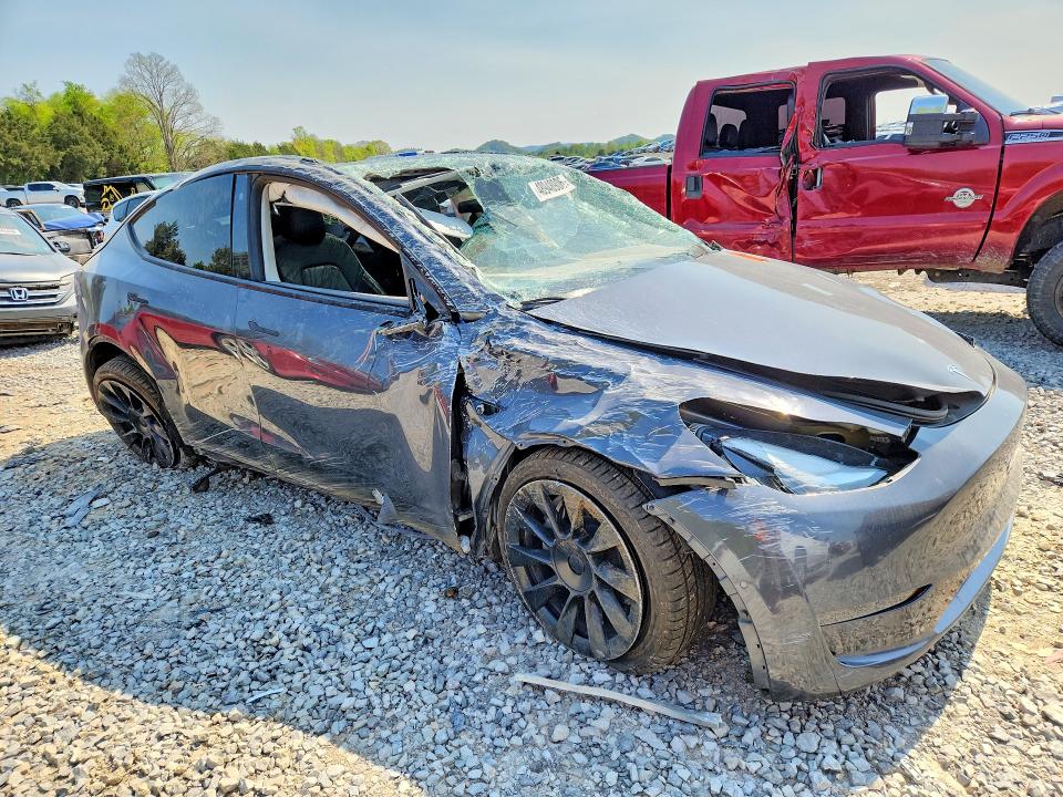 2021 Tesla Model y VIN 5YJYGDEE9MF077368 COPART salvage auction — ALL OVER, Tn - Cert Of Title-Rebuilt Vehicle (P), sold $3,500 on 2026-07-28 (photo 4)