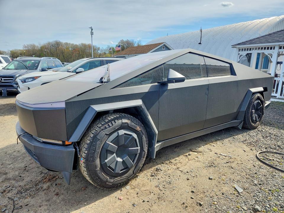 2024 Tesla Cybertruck VIN 7G2CEHED1RA001322 COPART salvage auction — REAR END, Tx - Salvage Vehicle Title (P), sold $41,750 on 2026-07-27 (photo 1)
