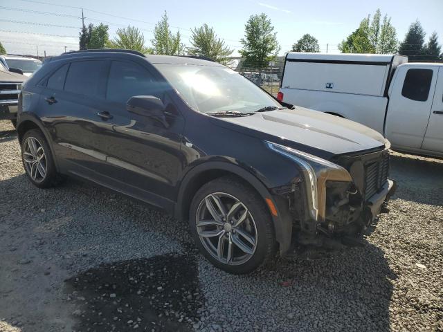 2019 CADILLAC XT4 VIN 1GYFZFR40KF120500 COPART salvage auction — SIDE, Salvage Title, sold $8,500 on 2023-10-03 (photo 4)