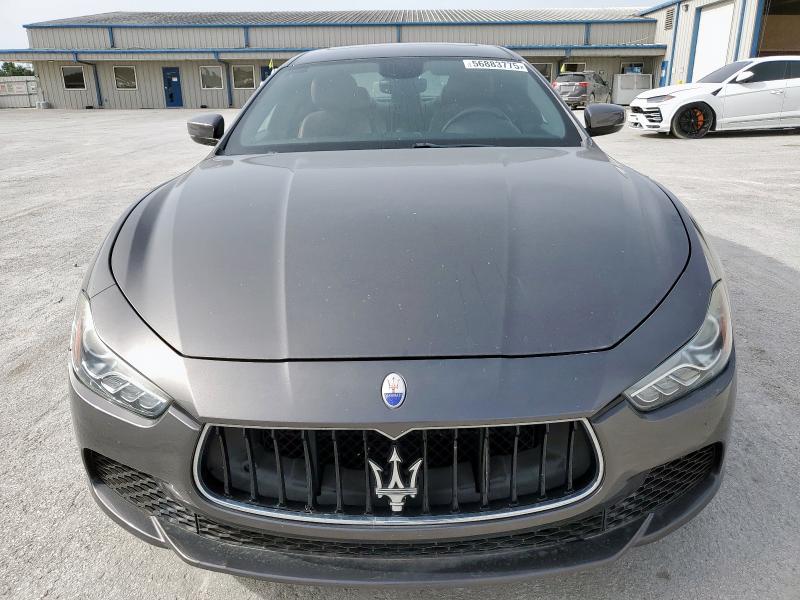 2017 Maserati Ghibli VIN ZAM57XSA9H1206127 COPART salvage auction — NORMAL WEAR, TX - CERT OF TITLE-REBUILT SALVAGE (P), sold $32,750 on 2025-07-03 (photo 5)