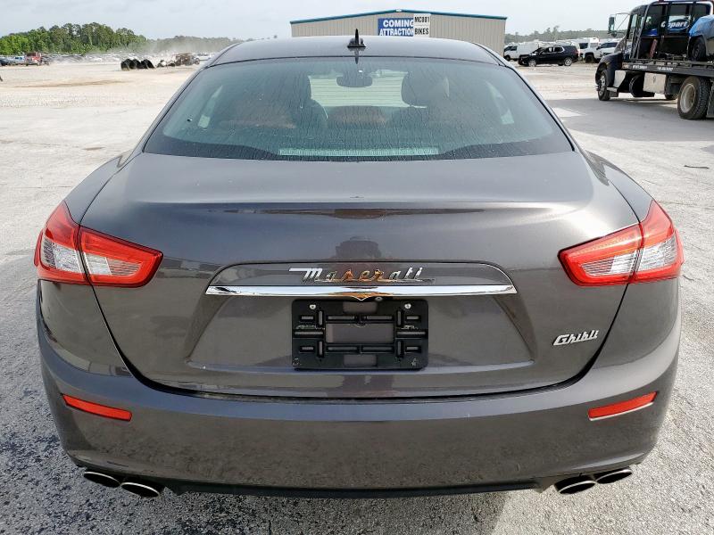 2017 Maserati Ghibli VIN ZAM57XSA9H1206127 COPART salvage auction — NORMAL WEAR, TX - CERT OF TITLE-REBUILT SALVAGE (P), sold $32,750 on 2025-07-03 (photo 6)