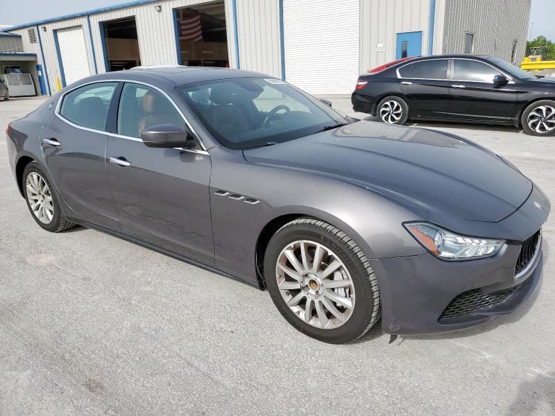 2017 Maserati Ghibli VIN ZAM57XSA9H1206127 COPART salvage auction — NORMAL WEAR, TX - CERT OF TITLE-REBUILT SALVAGE (P), sold $32,750 on 2025-07-03 (photo 4)