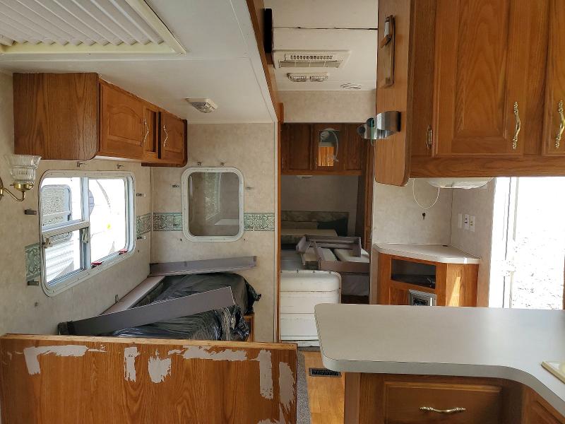 2005 Cherokee by forest r All models VIN 4X4TCKC225P092685 COPART salvage auction — WATER/FLOOD, SF, sold $30 on 2026-07-16 (photo 5)