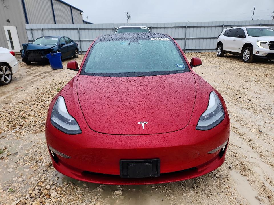 2021 Tesla Model 3 VIN 5YJ3E1EB0MF048913 COPART salvage auction — NORMAL WEAR, Tx - Certificate Of Title, sold $17,500 on 2026-07-14 (photo 5)