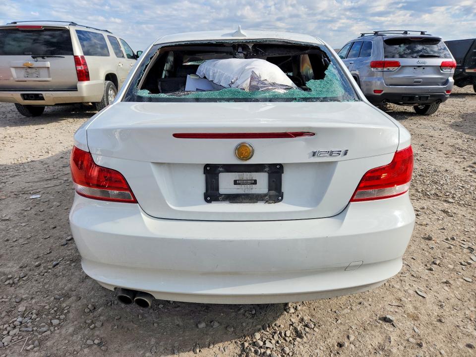 2013 BMW 1 series VIN WBAUP9C58DVS95279 COPART salvage auction — INTERIOR BURN, Ut - Salvage Certificate, sold $325 on 2026-07-10 (photo 6)