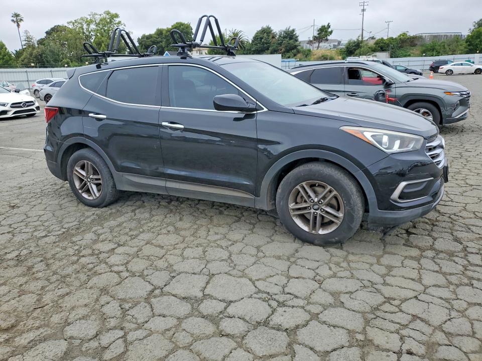 2017 Hyundai Santa fe VIN 5XYZTDLB7HG444193 COPART salvage auction — MINOR DENT/SCRATCHES, Fl - Dis/Dlr/Exp Only Clean Title, sold $3,400 on 2026-07-17 (photo 4)