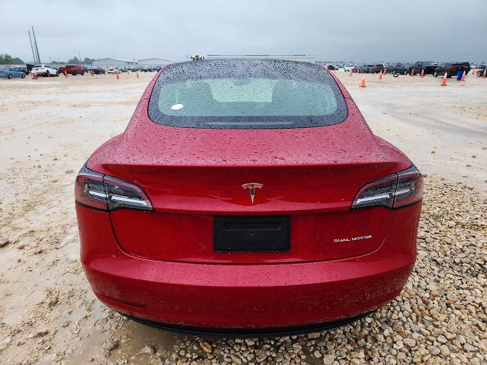 2021 Tesla Model 3 VIN 5YJ3E1EB0MF048913 COPART salvage auction — NORMAL WEAR, Tx - Certificate Of Title, sold $17,500 on 2026-07-14 (photo 6)