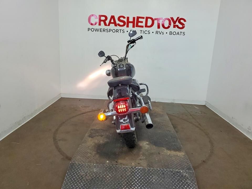 2008 Harley-davidson Fl VIN 1HD1BW5138Y034030 COPART salvage auction — VANDALISM, MN - CERT OF TITLE-PRIOR SALVAGE, sold $525 on 2026-07-09 (photo 4)