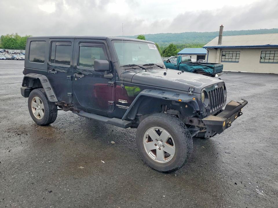 2010 Jeep Wrangler / VIN 1J4BA5H19AL162283 COPART salvage auction — MINOR DENT/SCRATCHES, Pa - Cert Of Title (P), sold $4,550 on 2026-07-09 (photo 4)