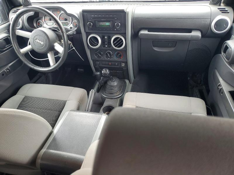 2010 Jeep Wrangler / VIN 1J4BA5H19AL162283 COPART salvage auction — MINOR DENT/SCRATCHES, Pa - Cert Of Title (P), sold $4,550 on 2026-07-09 (photo 8)