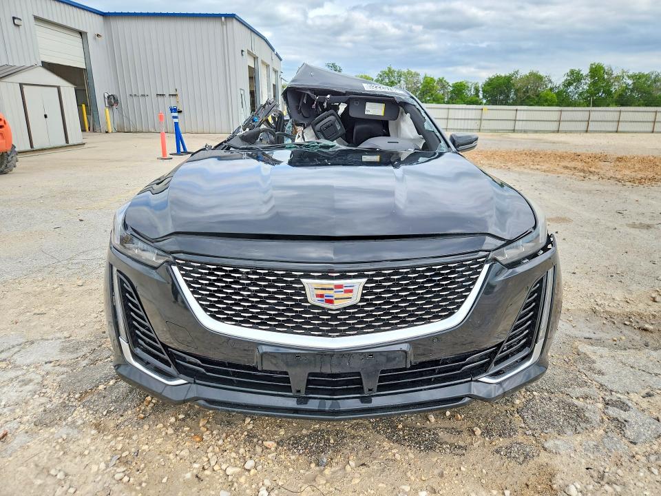 2023 Cadillac Ct5 VIN 1G6DN5RK0P0133410 COPART salvage auction — SIDE, Tx - Certificate Of Title, sold $3,700 on 2026-07-02 (photo 5)