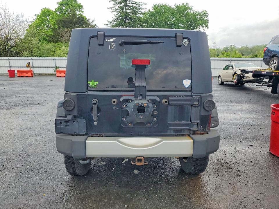 2010 Jeep Wrangler / VIN 1J4BA5H19AL162283 COPART salvage auction — MINOR DENT/SCRATCHES, Pa - Cert Of Title (P), sold $4,550 on 2026-07-09 (photo 6)