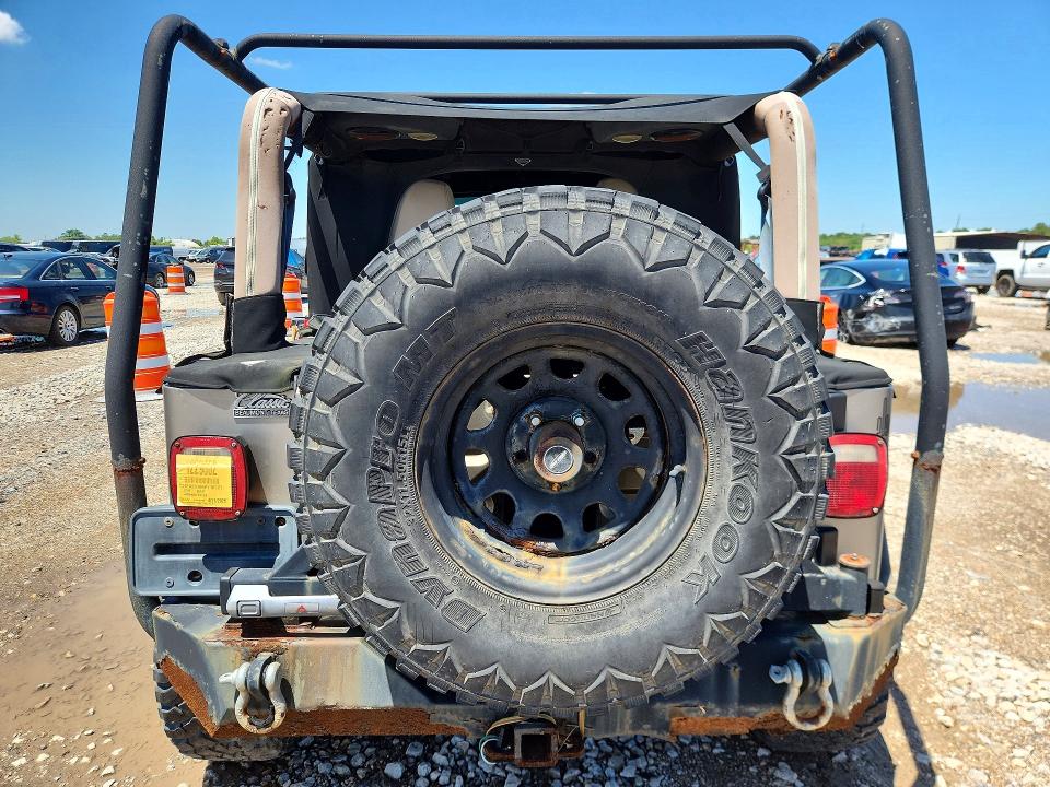 2006 Jeep Wrangler / VIN 1J4FA29196P716727 COPART salvage auction — NORMAL WEAR, Tx - Certificate Of Title (P), sold $2,600 on 2026-07-09 (photo 6)