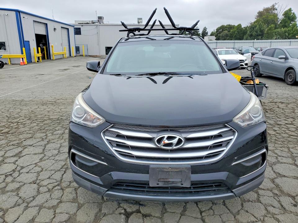 2017 Hyundai Santa fe VIN 5XYZTDLB7HG444193 COPART salvage auction — MINOR DENT/SCRATCHES, Fl - Dis/Dlr/Exp Only Clean Title, sold $3,400 on 2026-07-17 (photo 5)