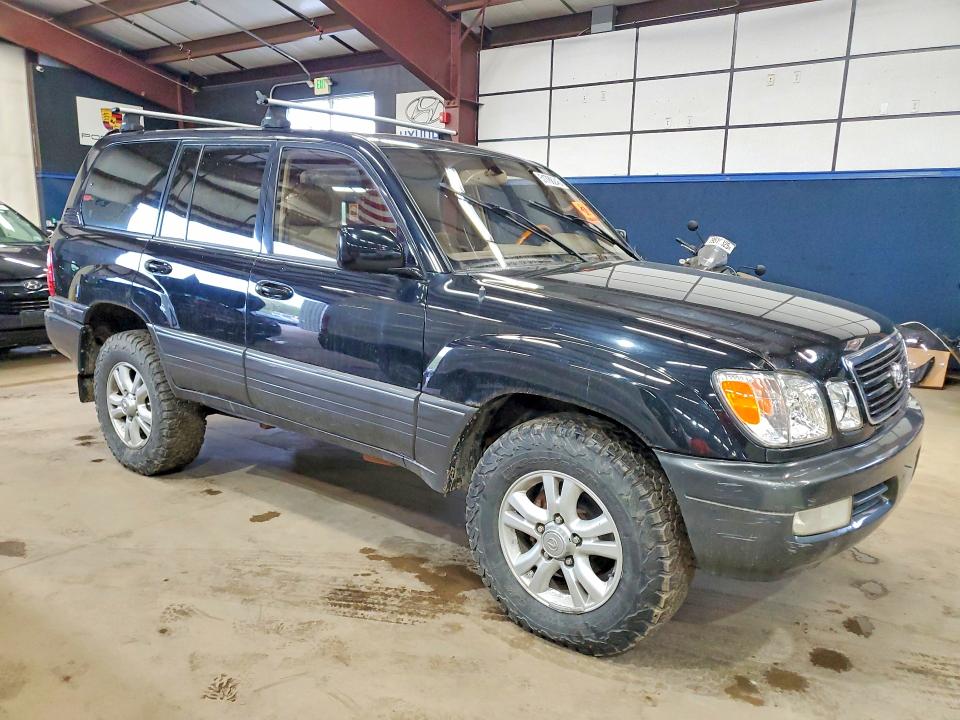 2002 Lexus Lx470 VIN JTJHT00W723516093 COPART salvage auction — MINOR DENT/SCRATCHES, NH - CERTIFICATE OF TITLE, sold $5,400 on 2026-07-31 (photo 4)