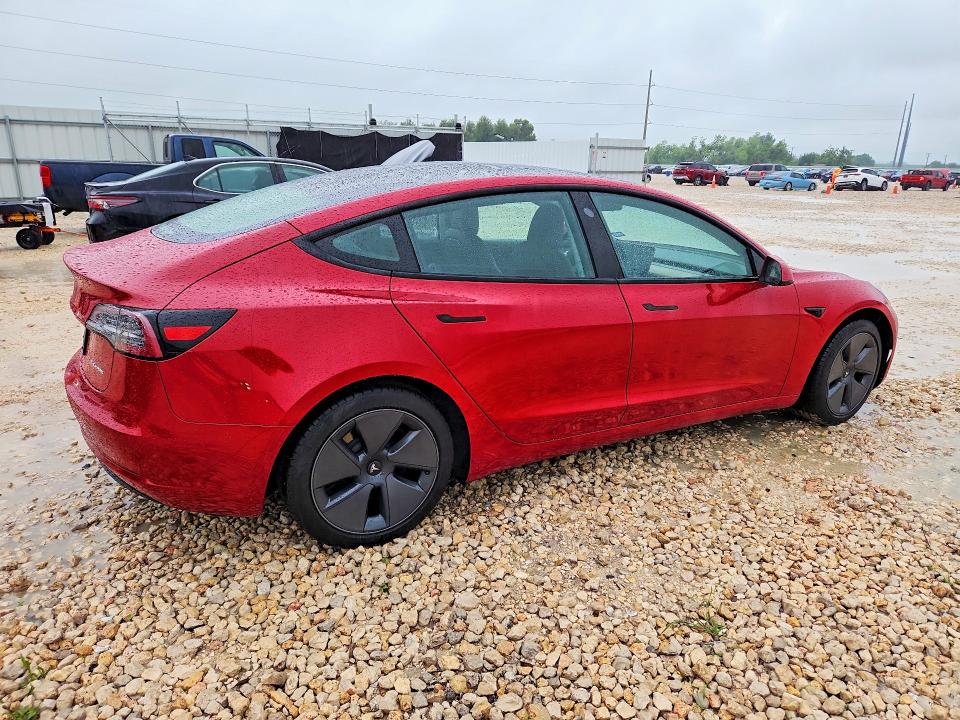2021 Tesla Model 3 VIN 5YJ3E1EB0MF048913 COPART salvage auction — NORMAL WEAR, Tx - Certificate Of Title, sold $17,500 on 2026-07-14 (photo 3)