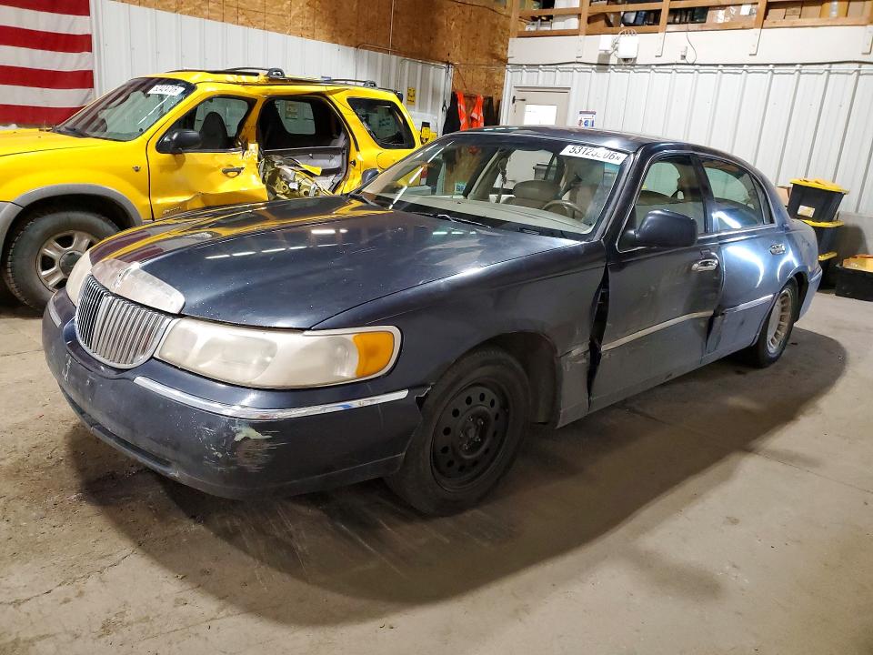 2000 Lincoln Towncar VIN 1LNHM81W2YY894293 COPART salvage auction — SIDE, Ak - Certificate Of Vehicle Title, sold $20 on 2026-07-28 (photo 1)