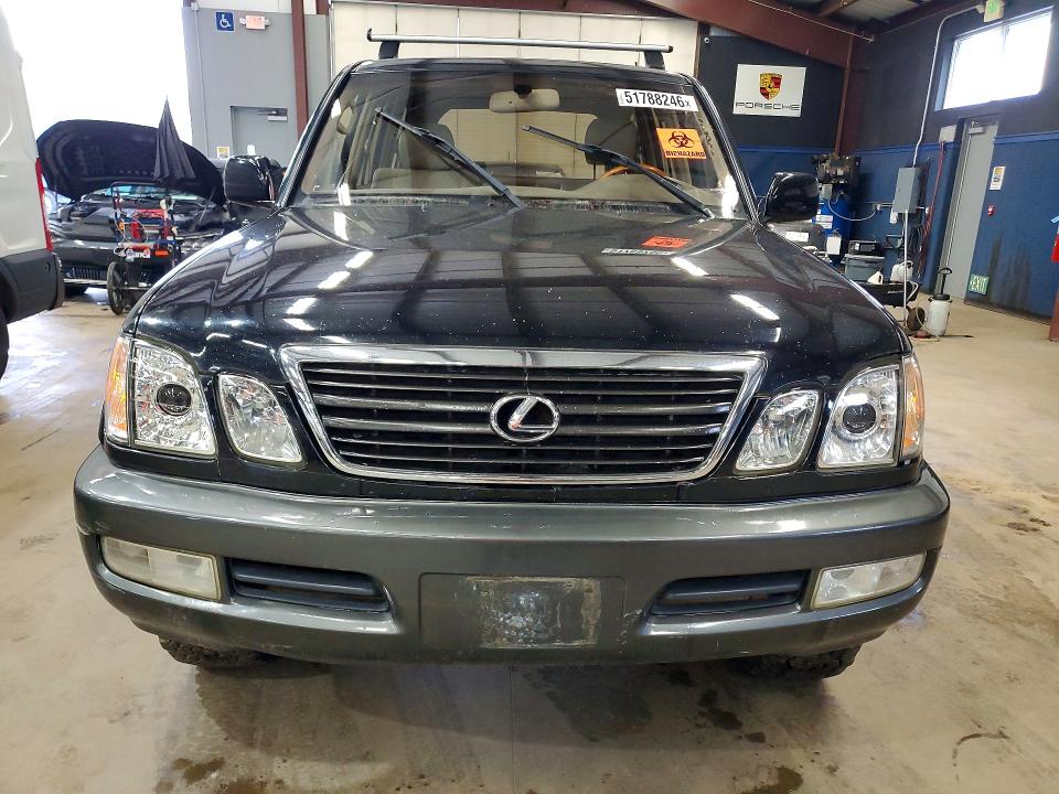 2002 Lexus Lx470 VIN JTJHT00W723516093 COPART salvage auction — MINOR DENT/SCRATCHES, NH - CERTIFICATE OF TITLE, sold $5,400 on 2026-07-31 (photo 5)