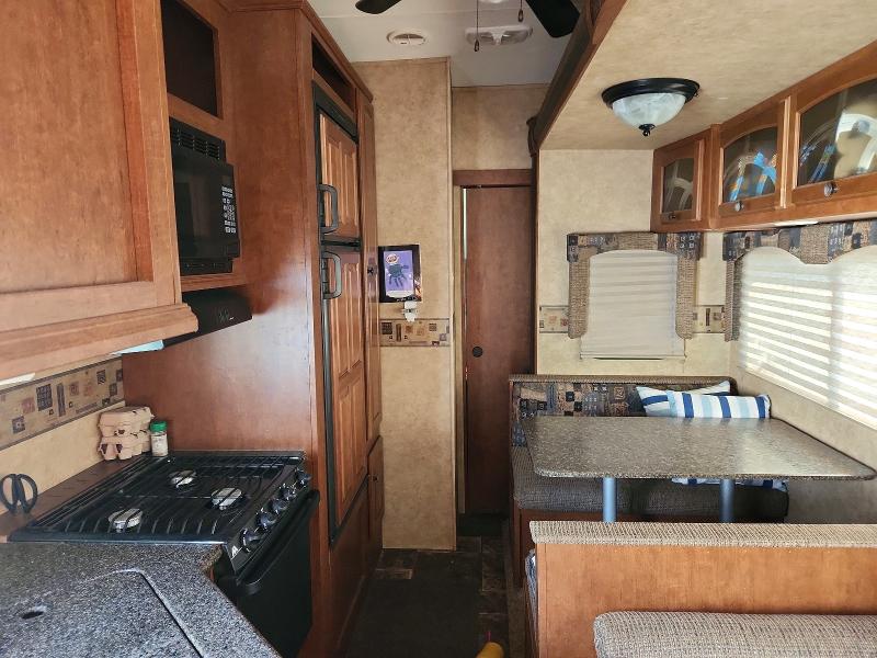2012 Heartland rv All models VIN 5SFRG3220CE238325 COPART salvage auction — VANDALISM, NH - CERT OF TITLE-SALVAGE, sold $800 on 2026-07-07 (photo 6)